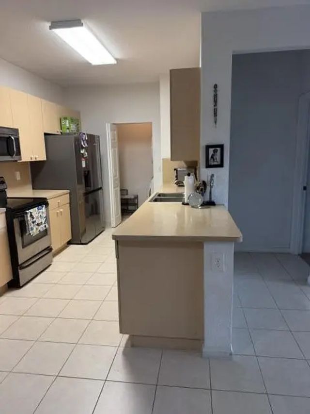 5 of 23 - 3569 S Forest Hill Boulevard #106, Palm Springs, FL
