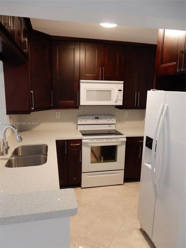 4 of 59 - 5051 W Oakland Park Boulevard #302, Lauderdale Lakes, FL