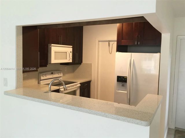 5 of 59 - 5051 W Oakland Park Boulevard #302, Lauderdale Lakes, FL