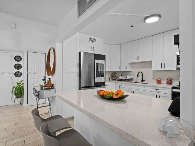 2 of 60 - 671 Ne 195th Street #329e, Miami, FL