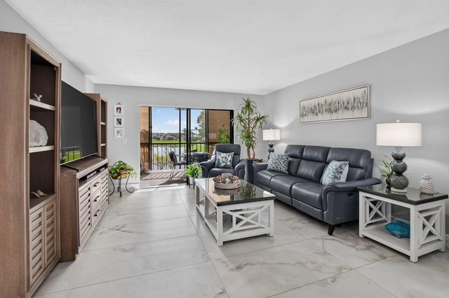 2 of 58 - 7310 Ashford Place #205, Delray Beach, FL