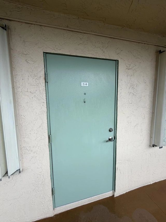2 of 25 - 700 Village Green Court #314, Palm Springs, FL