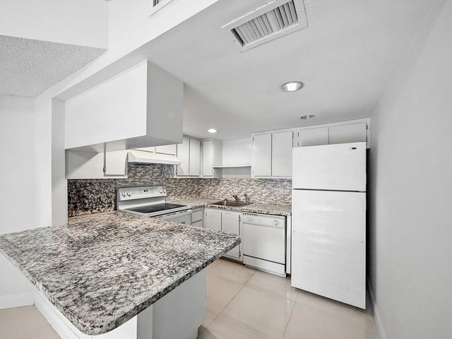 5 of 59 - 8290 Lake Drive #250, Doral, FL