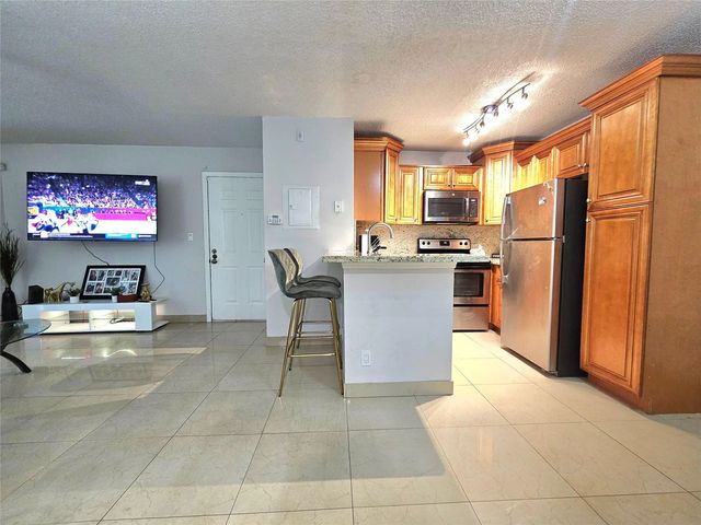 5 of 32 - 701 Lyons Road #13103, Coconut Creek, FL