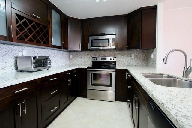 2 of 27 - 10777 W Sample Road #716, Coral Springs, FL