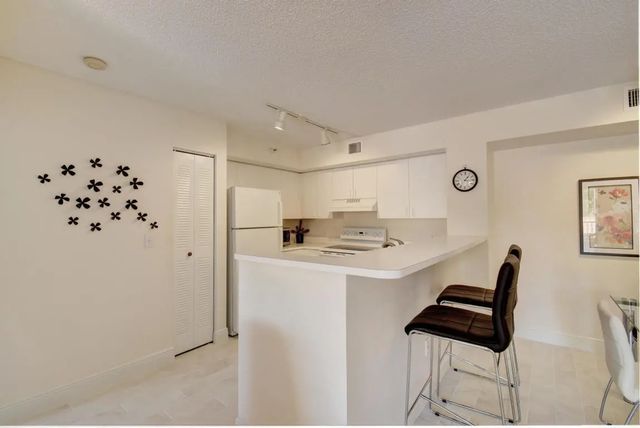 2 of 30 - 135 Yacht Club Way #207, Hypoluxo, FL