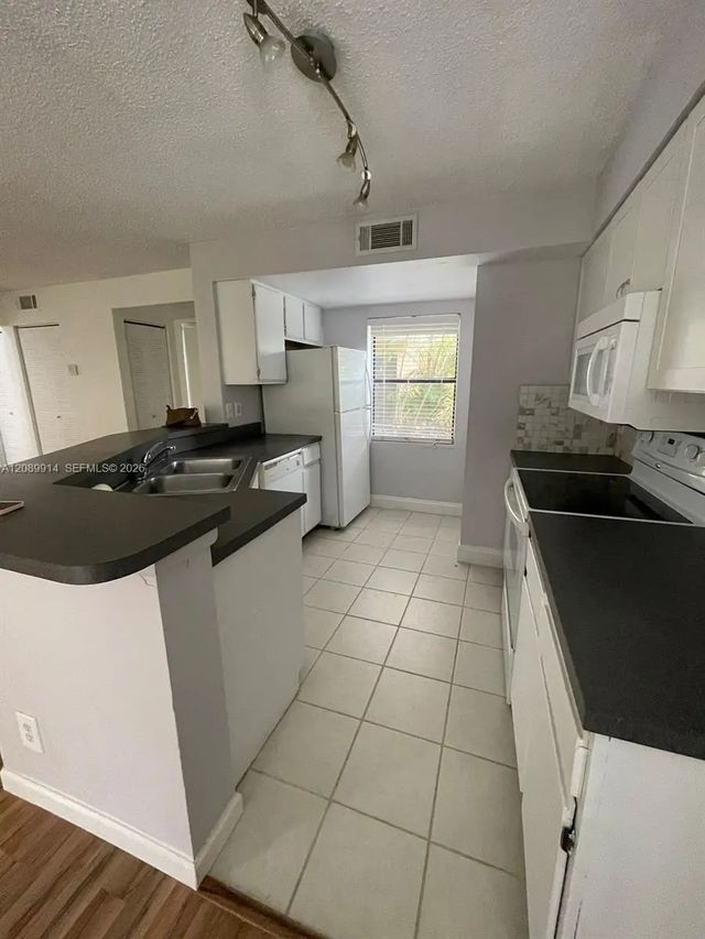 3 of 28 - 9999 Summerbreeze Drive #413, Sunrise, FL