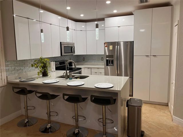 3 of 77 - 15257 Sw 8th Way, Miami, FL