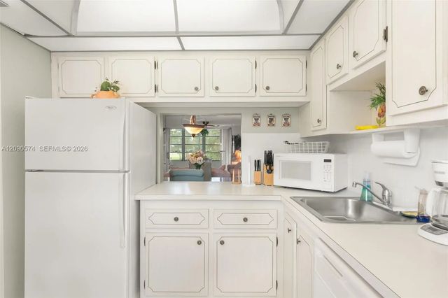 5 of 27 - 1040 Country Club Drive #208, Margate, FL