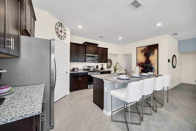 3 of 25 - 7656 Oakmoss Loop, Davenport, FL