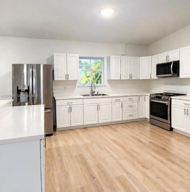 5 of 16 - 1411 Ne 201st Terrace, Miami, FL