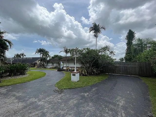 2 of 9 - 13250 N Calusa Club Drive, Miami, FL