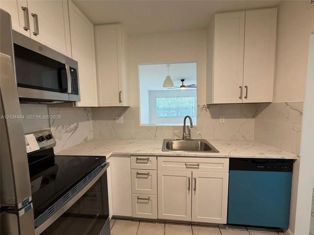 3 of 15 - 5001 W Oakland Park Boulevard #305, Lauderdale Lakes, FL