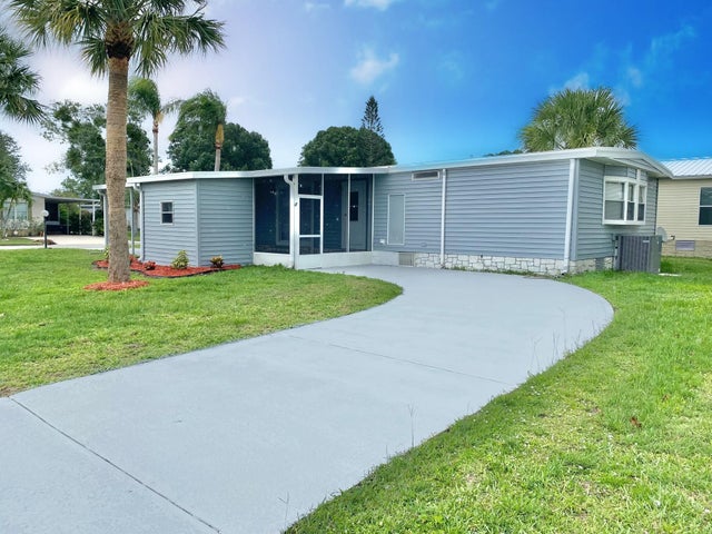 1 of 26 - 1038 Warbler Ct, Barefoot Bay, FL