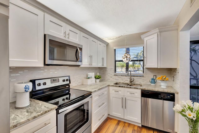 1 of 37 - 4700 Lucerne Lakes Boulevard #206, Lake Worth, FL