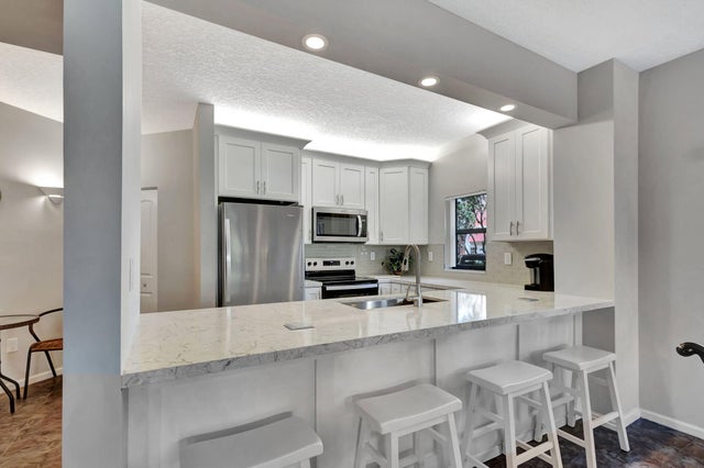 1 of 49 - 300 Uno Lago Drive #101, Juno Beach, FL