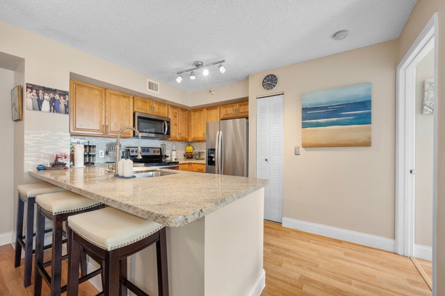 4 of 24 - 110 Yacht Club Way #104, Hypoluxo, FL
