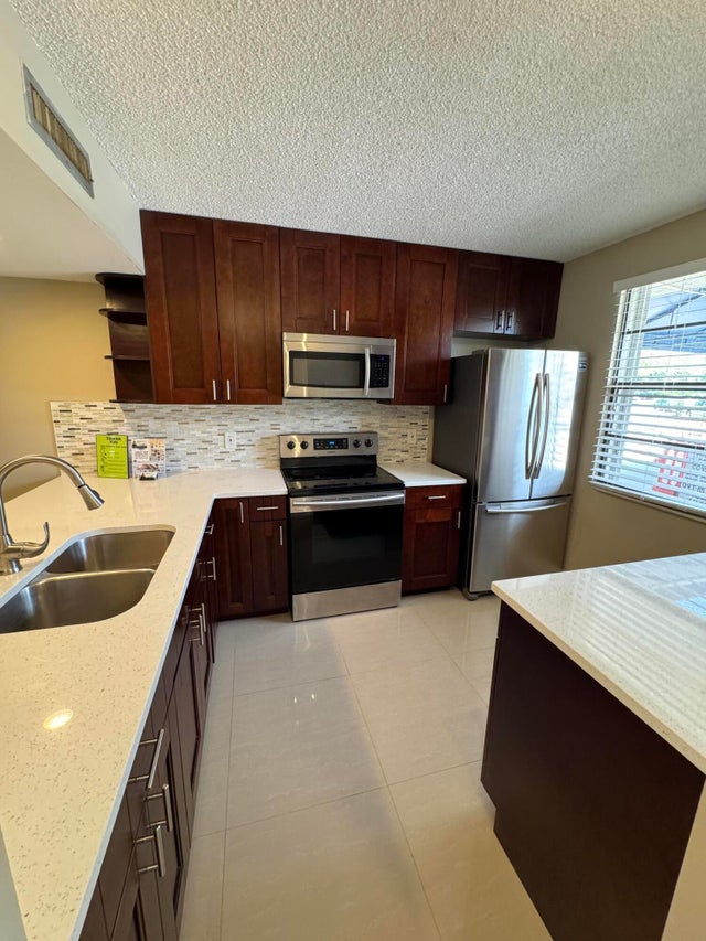 1 of 38 - 3521 Village Boulevard #103, West Palm Beach, FL