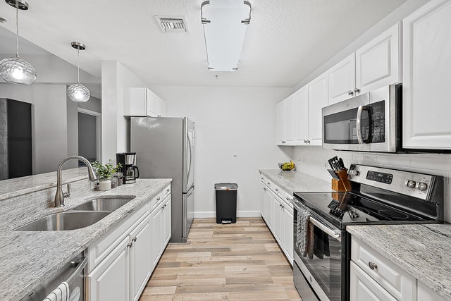 5 of 30 - 1203 Town Center Drive #203, Jupiter, FL
