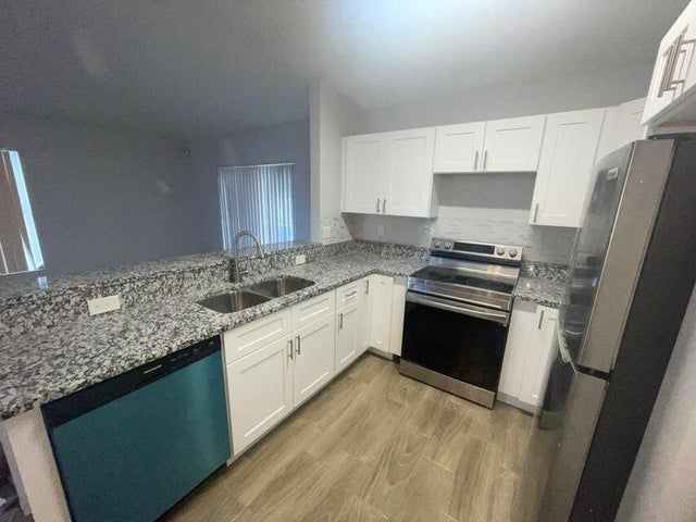 1 of 14 - 1105 W 9th St, Riviera Beach, FL