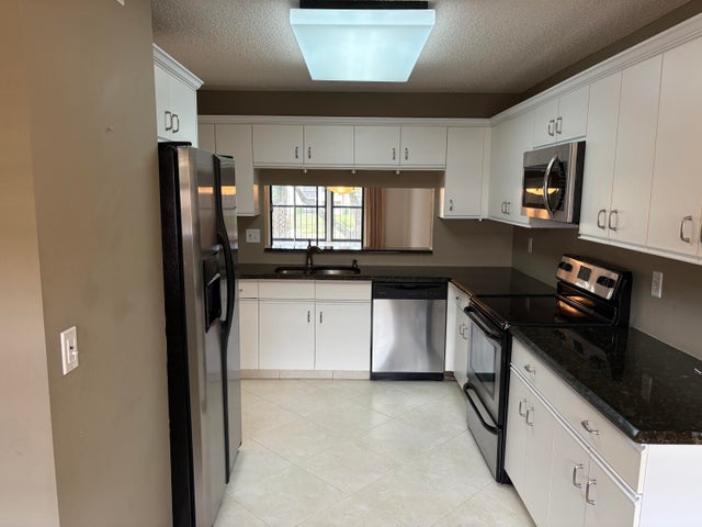 1 of 24 - 4725 Lucerne Lakes Boulevard #210, Lake Worth, FL