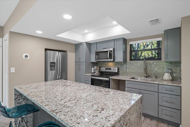 4 of 36 - 11863 Wimbledon Circle #438, Wellington, FL