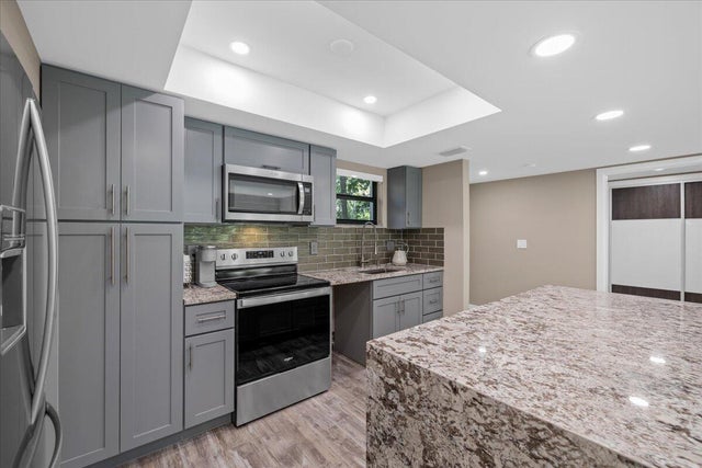 5 of 36 - 11863 Wimbledon Circle #438, Wellington, FL