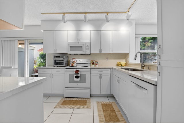 1 of 30 - 7390 Lake Meadow Way #101, Boynton Beach, FL