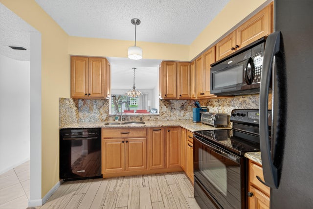 1 of 65 - 6193 Pointe Regal Circle #106, Delray Beach, FL