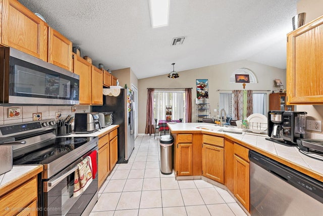 3 of 36 - 119 Hammocks Drive, Greenacres, FL