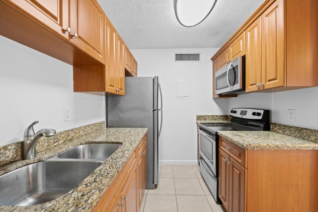 1 of 12 - 639 Executive Center Drive #o-105, West Palm Beach, FL