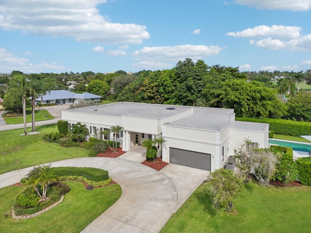1 of 61 - 257 N Country Club Drive, Atlantis, FL