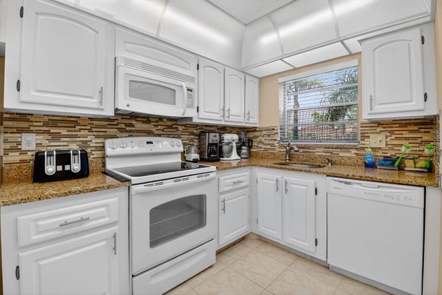 1 of 46 - 3810 Via Poinciana #206, Lake Worth, FL