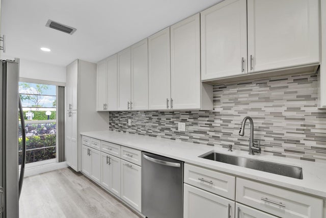 1 of 56 - 8844 Belle Aire Dr Drive #224, Boca Raton, FL