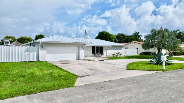 1 of 74 - 1861 Caribbean Road W, Lake Clarke Shores, FL