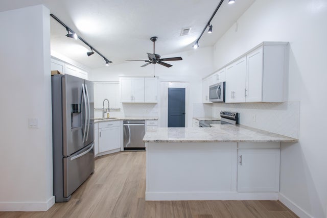 1 of 32 - 420 La Mancha Avenue, Royal Palm Beach, FL