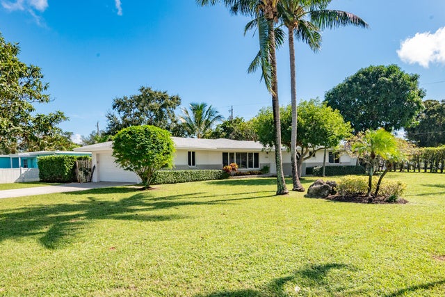 2 of 28 - 7504 Pine Tree Lane, Lake Clarke Shores, FL