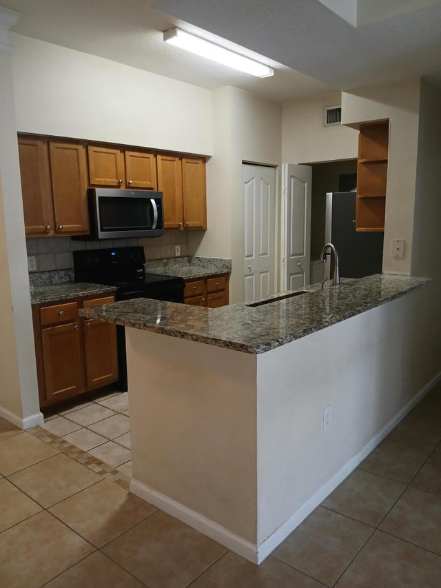 1 of 14 - 9833 Baywinds Dr #7202, Royal Palm Beach, FL