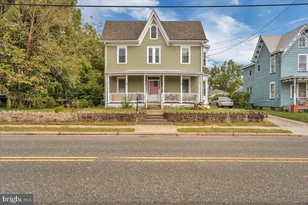 211-213 S Main St, ELMER
