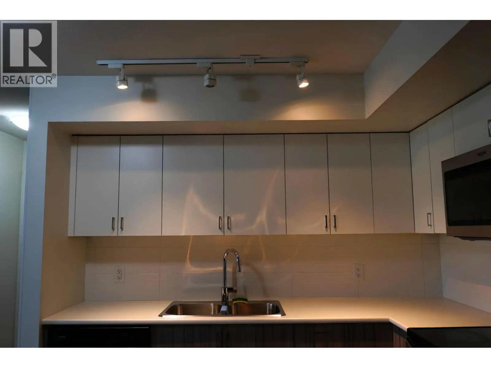 725 Academy Way Unit# 128. Kelowna, British Columbia