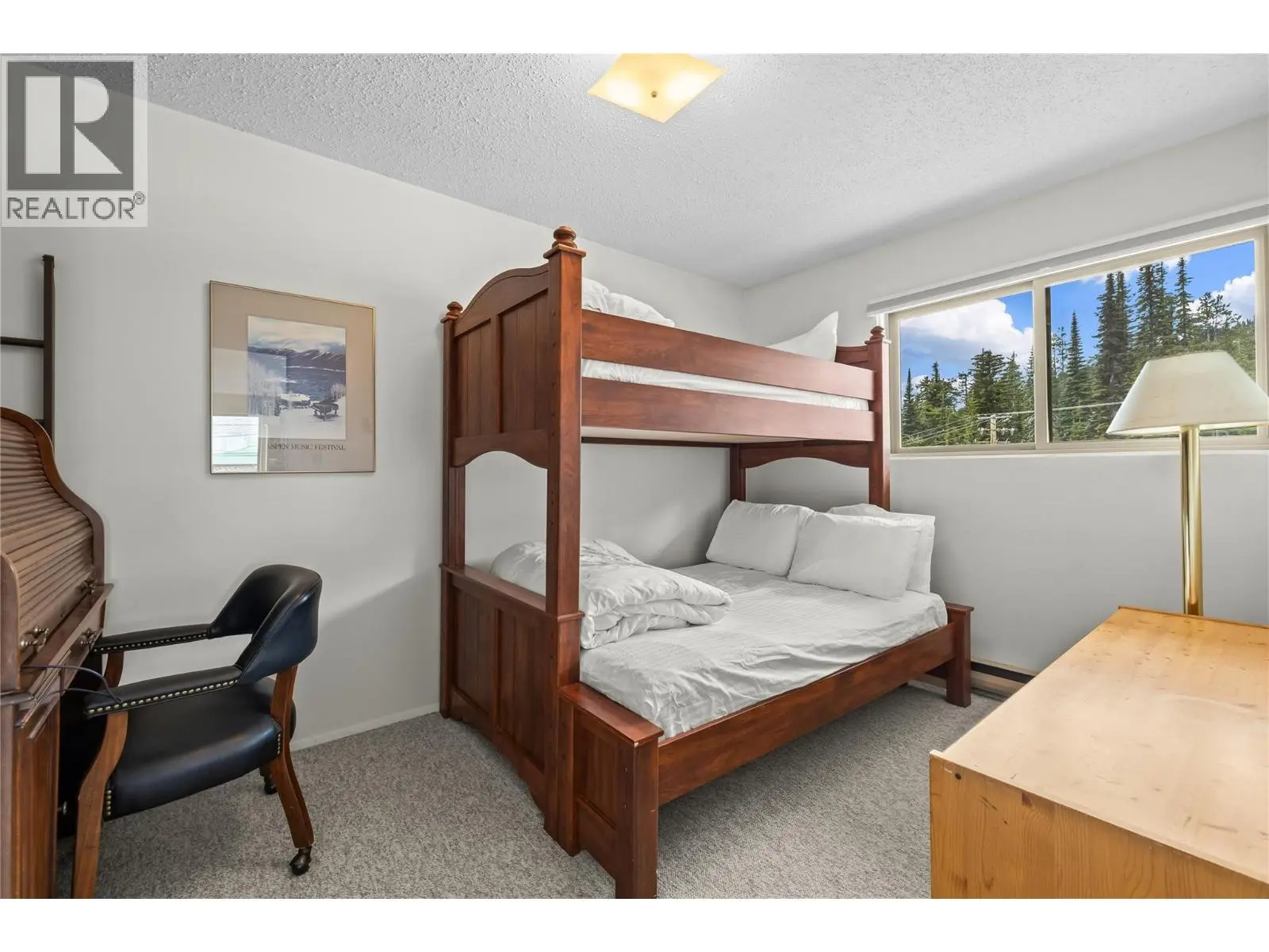 6430 Whiskey Jack Road Unit# 302. Big White, British Columbia