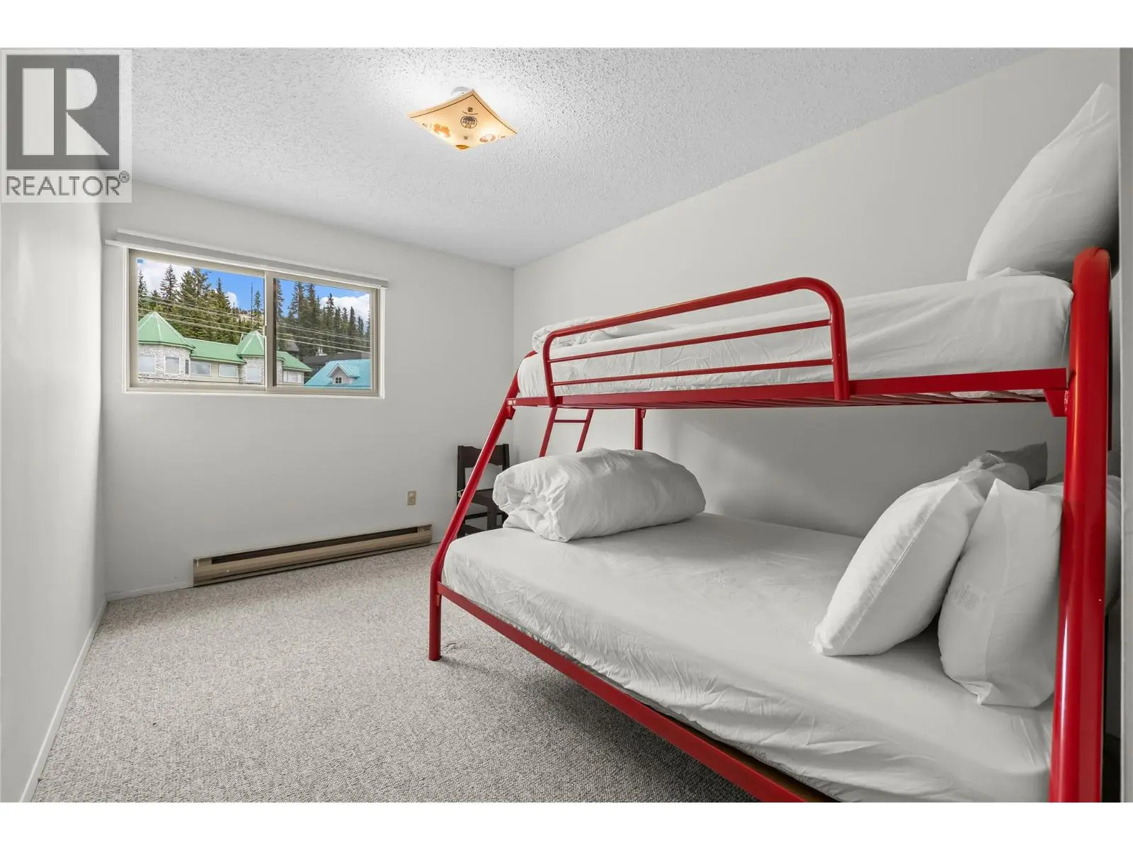 6430 Whiskey Jack Road Unit# 302. Big White, British Columbia