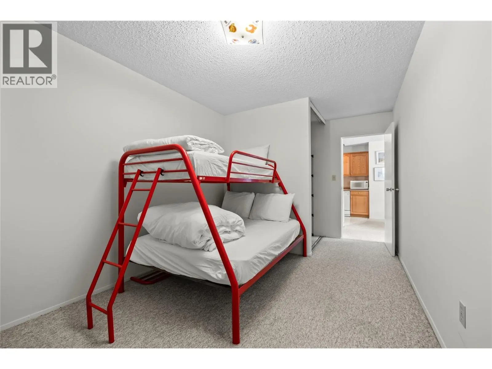 6430 Whiskey Jack Road Unit# 302. Big White, British Columbia