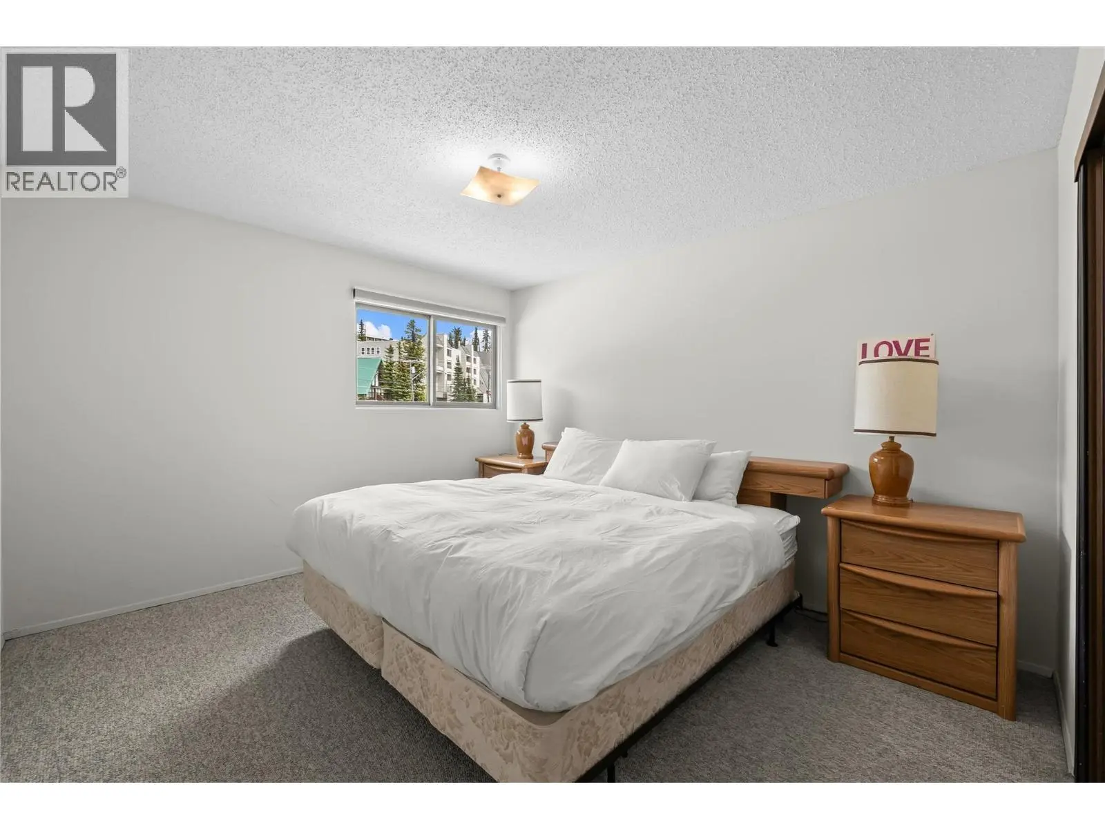 6430 Whiskey Jack Road Unit# 302. Big White, British Columbia