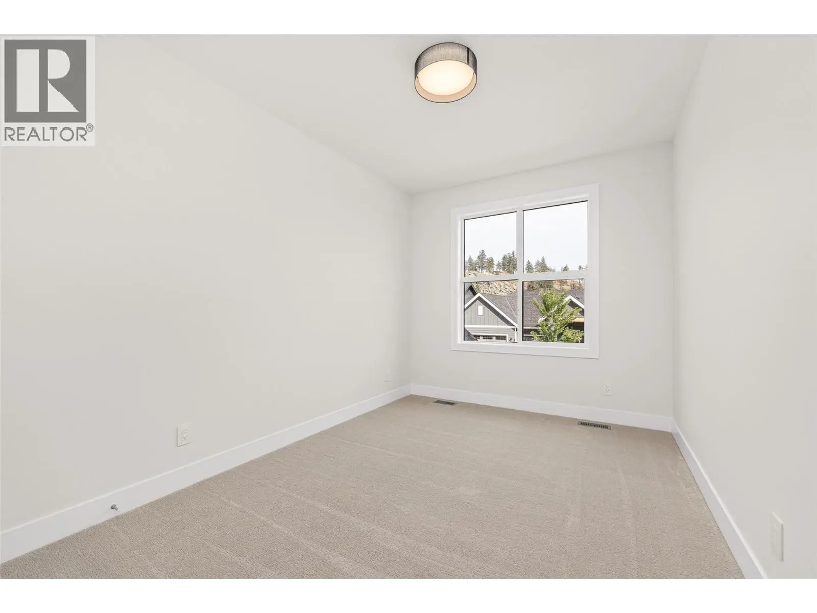 1448 Whistling Pine Place. Kelowna, British Columbia