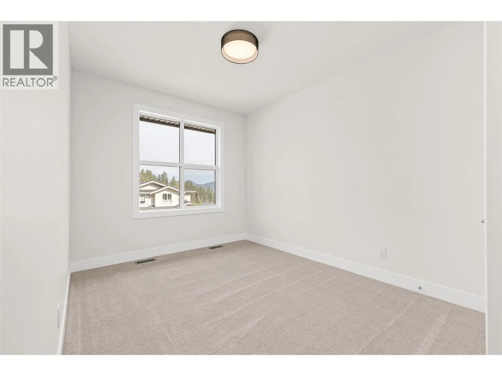 1448 Whistling Pine Place. Kelowna, British Columbia