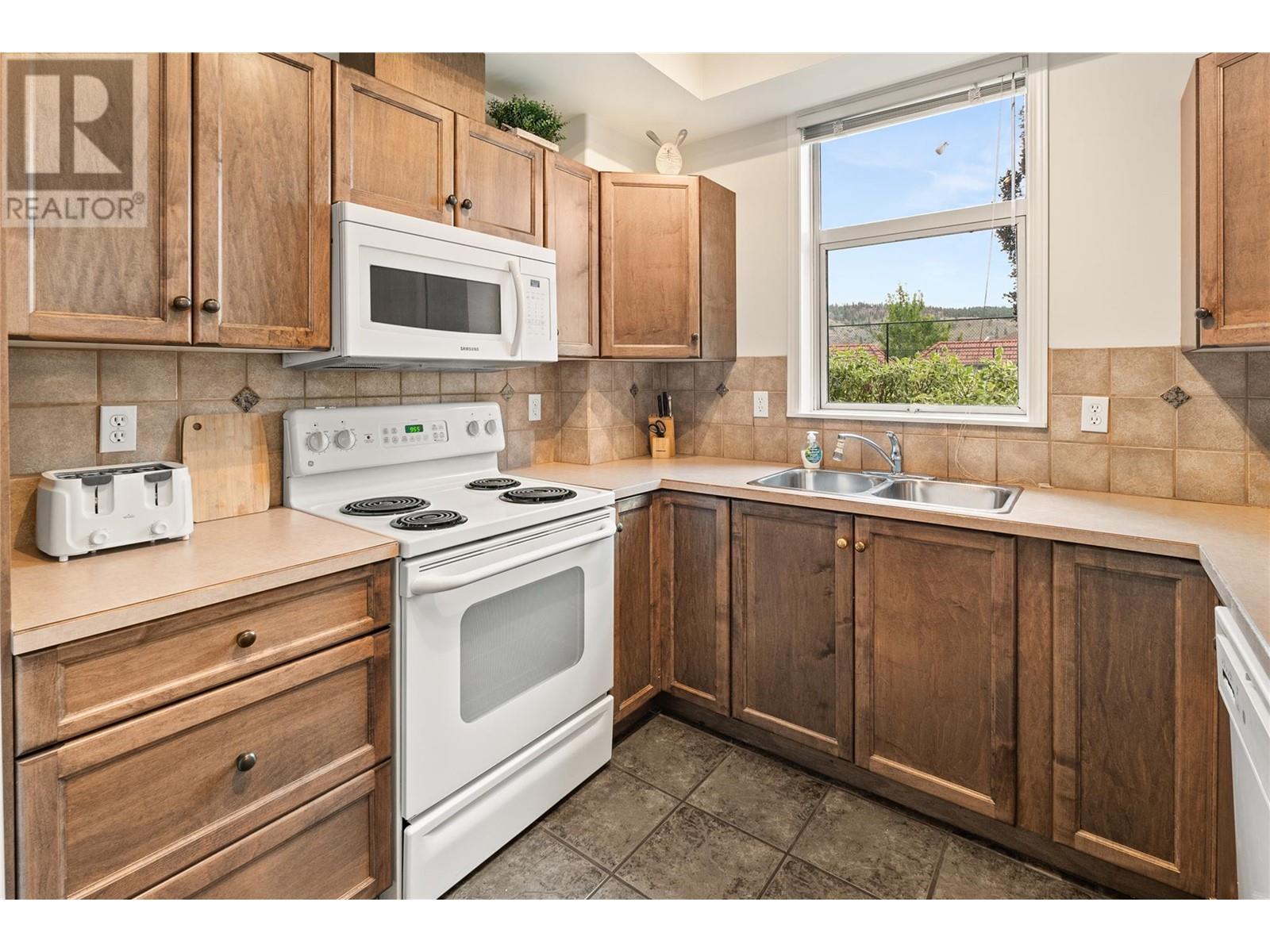 1128 Sunset Drive Unit# 303. Kelowna, British Columbia