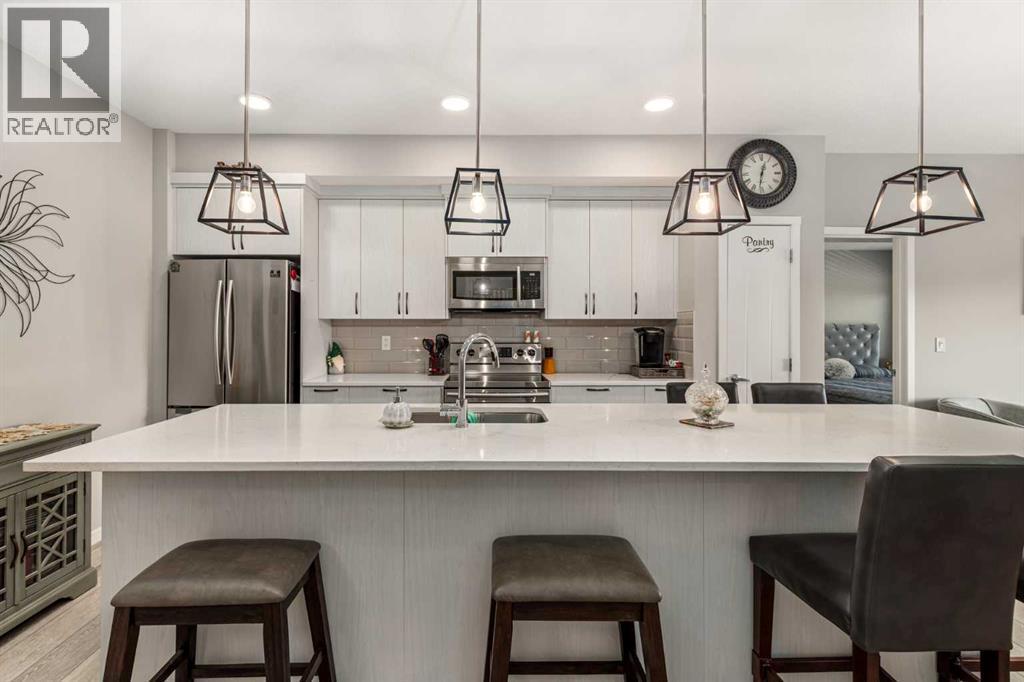 113, 370 Harvest Hills Common Ne, Calgary