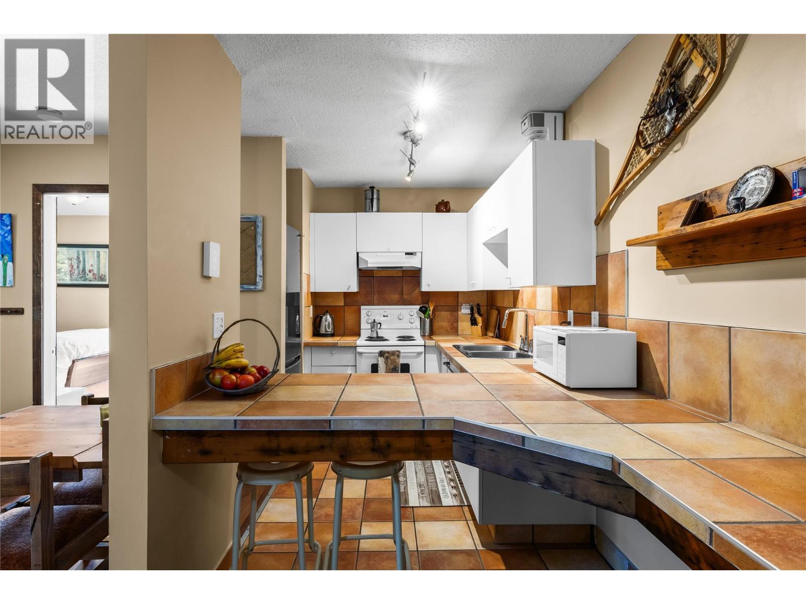 6375 Whiskey Jack Road Unit# 308. Big White, British Columbia