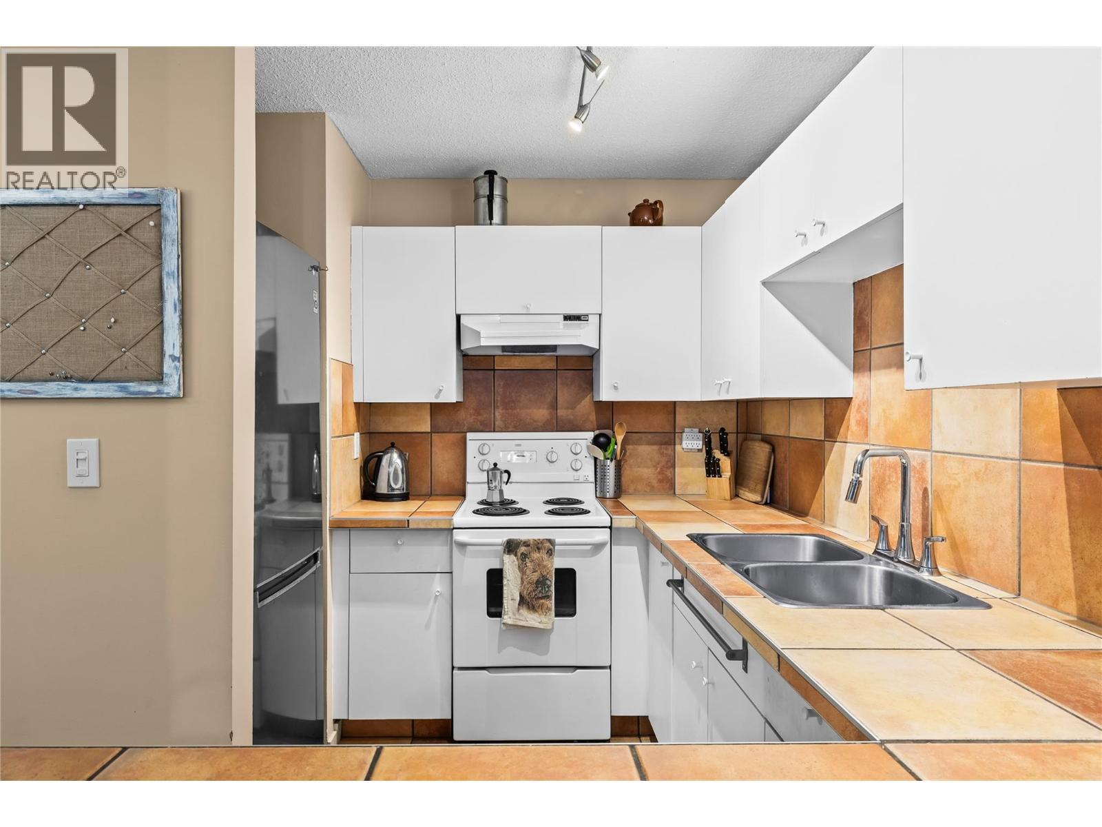 6375 Whiskey Jack Road Unit# 308. Big White, British Columbia